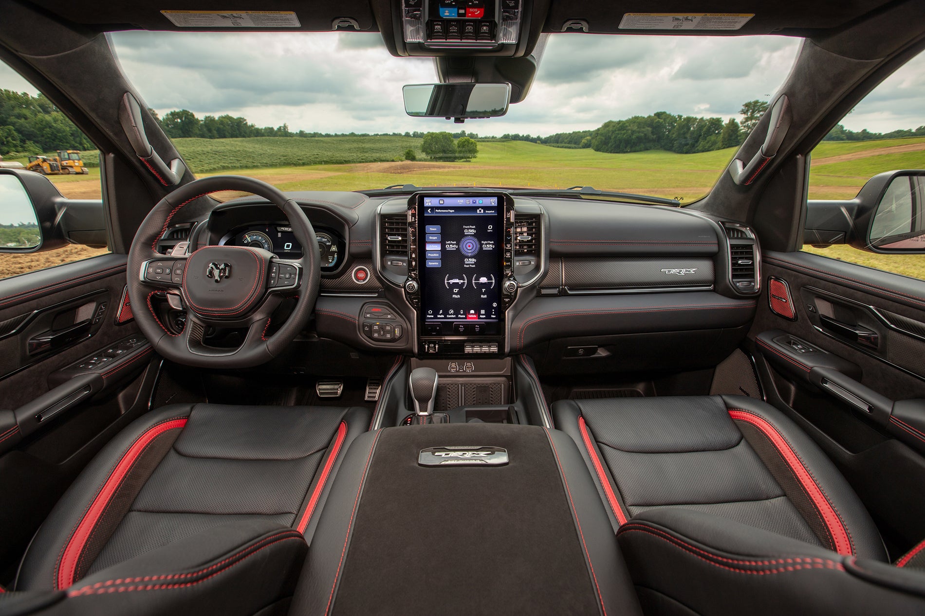2027 Ram 1500 TRX SRT interior with leather and suede surfaces and red accent stitching