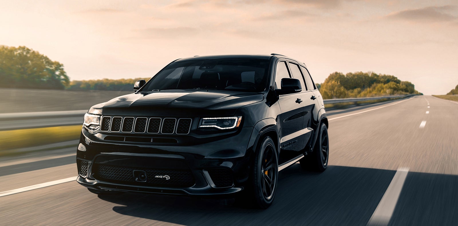 CDJR SUV driving on highway